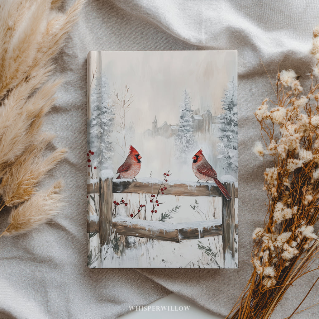 Winterkardinale Hardcover-Notizbuch – Verschneite Zaunmotive, Weihnachtsmotiv, Geschenkidee mit roten Vögeln