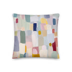 Decorative pillow with abstract multicolor pattern on a white background